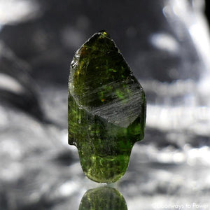 Had Carved Green Tourmaline Crystal Skull Talisman