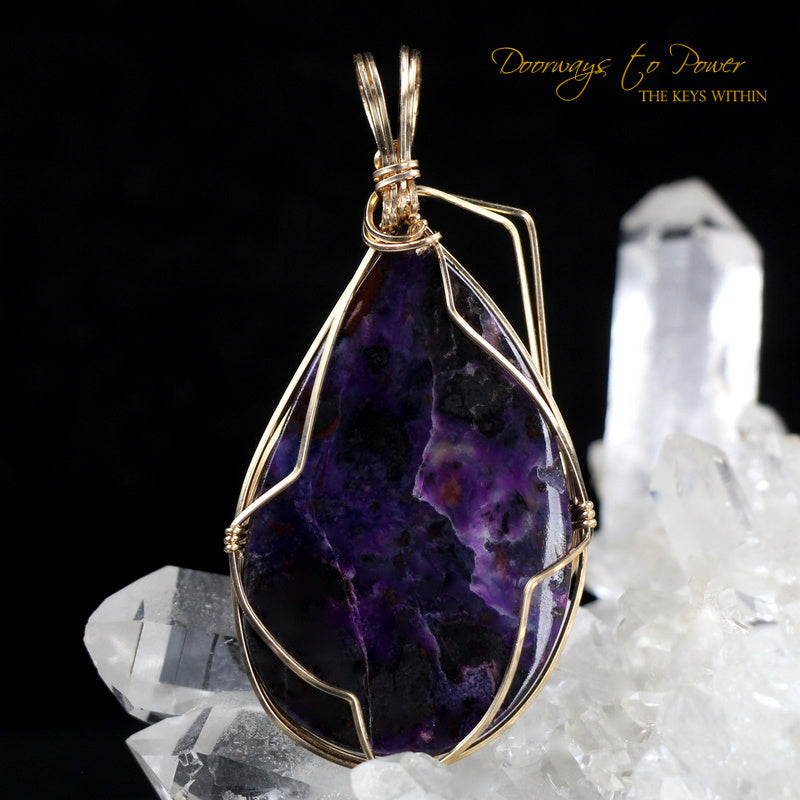 Sugilite Crystal Pendant™ 'Beacon of Light' 14k