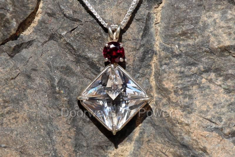 Clear Quartz Magician Stone with Garnet