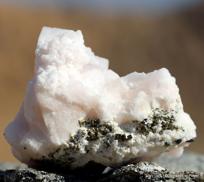 Pink Mangano Calcite with Pyrite